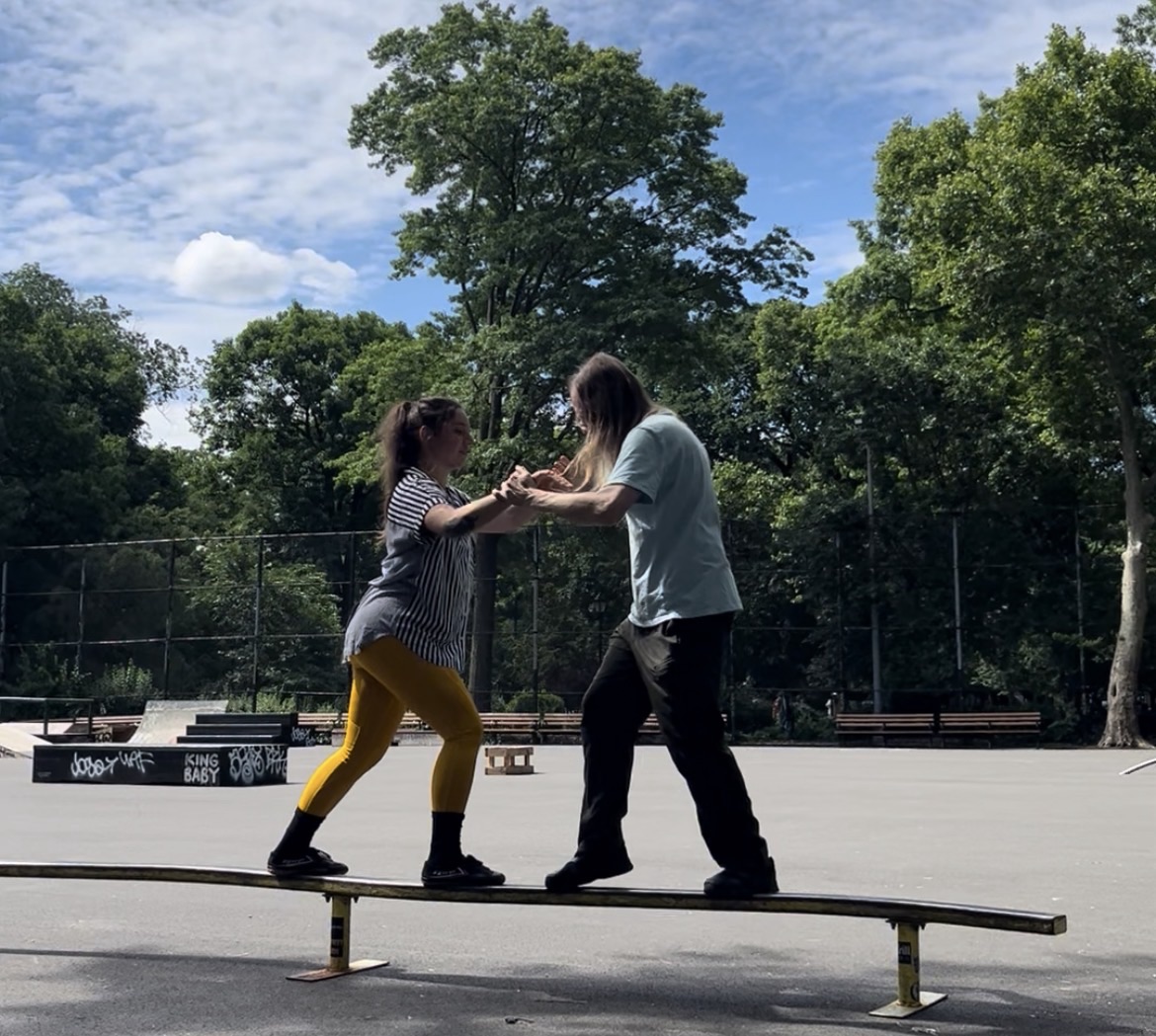 Sifu Bito and Sifu McConnell push hands at the skate park